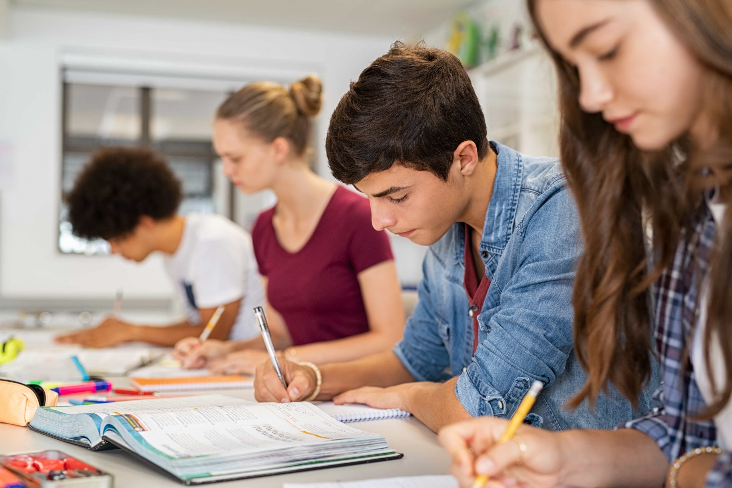 high-school-students-doing-exam-in-classroom-2021-08-29-11-16-06-utc (1)